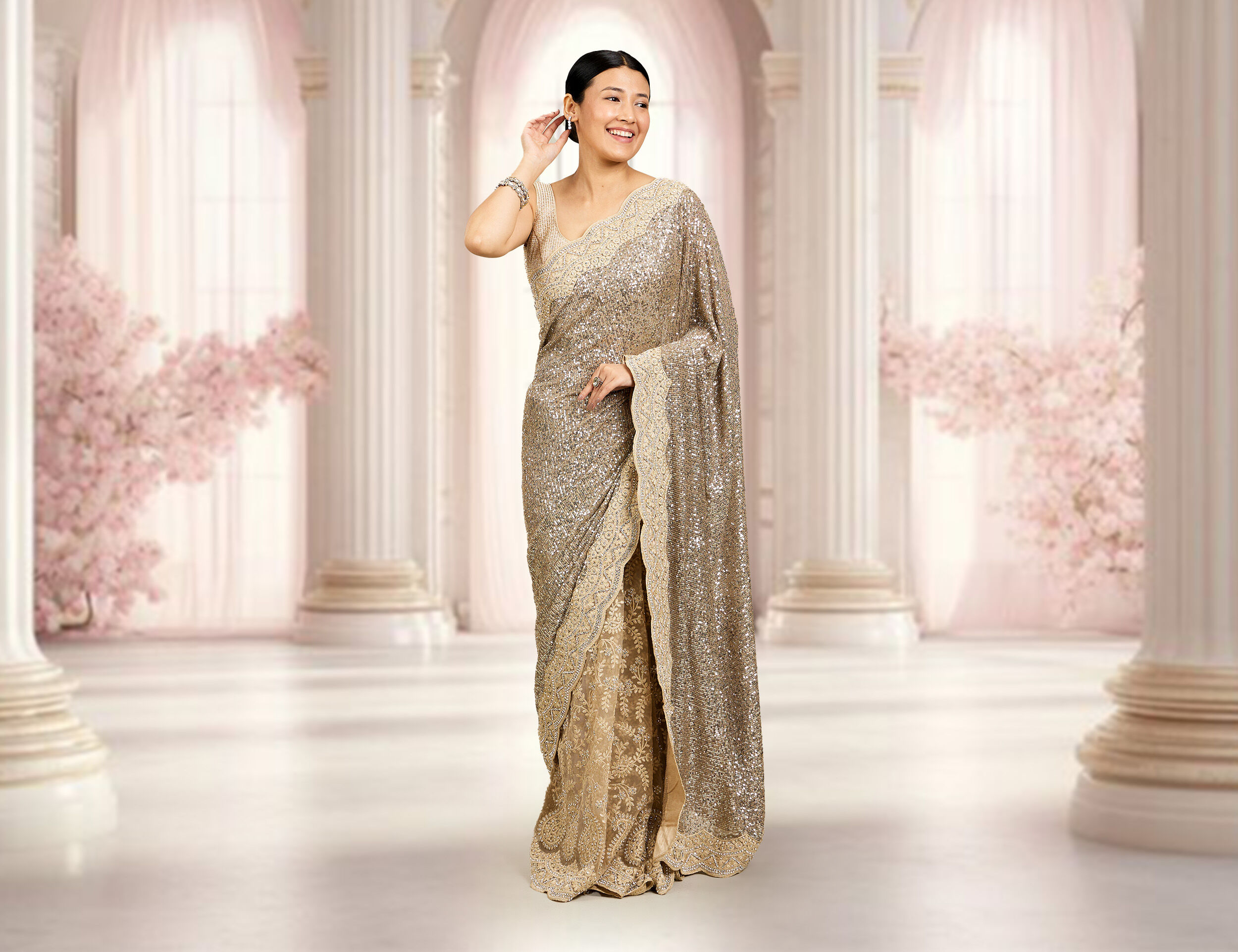 A women in beautifull golden bridal saree 
